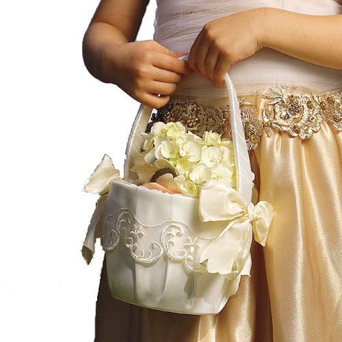 Flower girl with basket of flower petals
