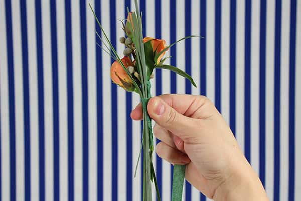 diy spray rose boutonniere tutorial- tape bear grass