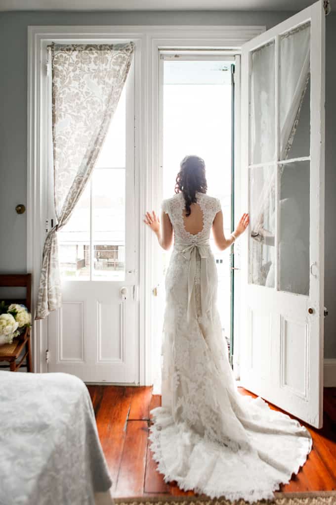 bride looking out a door