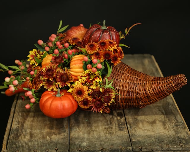 Thanksgiving flower Cornucopia with Mums, Berries, and Pumpkins