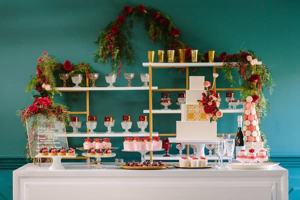 dessert bar with decorative greens