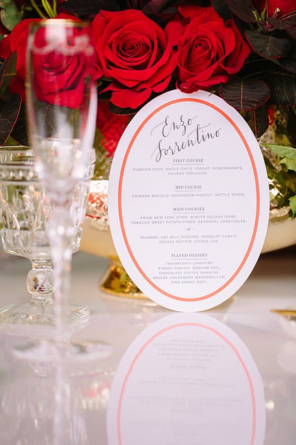 menu surrounded by red roses