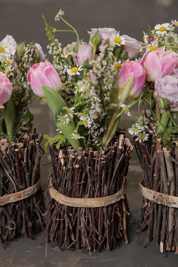 spring flower arrangement with spray roses and tulips
