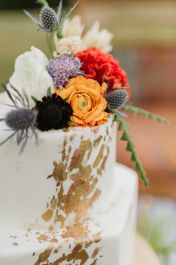 decorative outdoor wedding cake with floral aspect