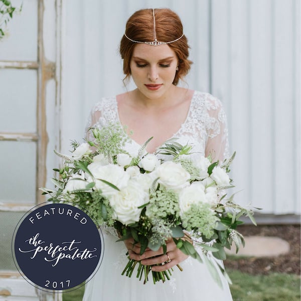 bride with large white bouquet
