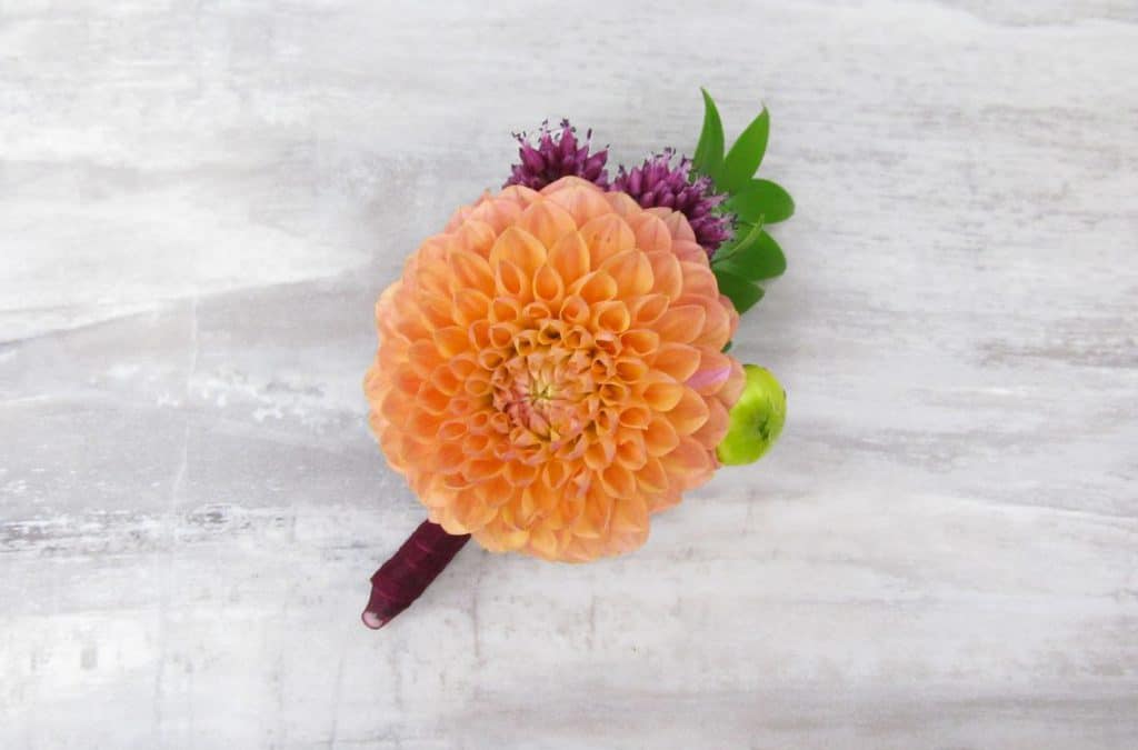 sunset dahlia boutonniere