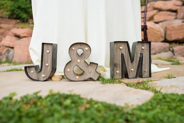 J&M letters in front of white background