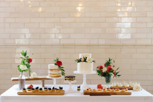 cakes and dessert bar with white tile background