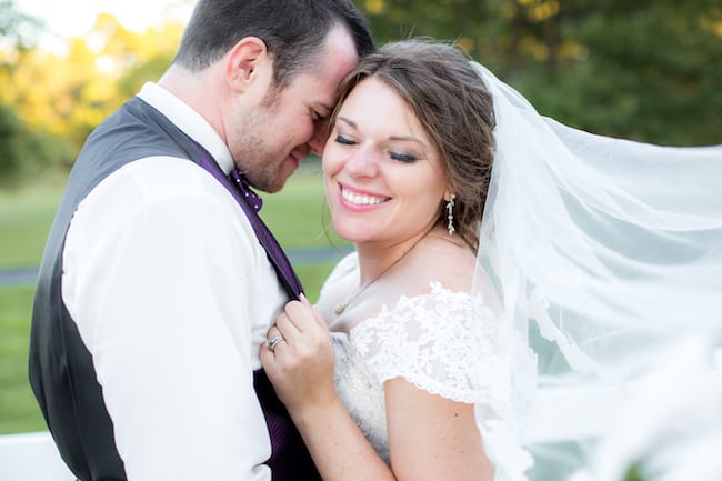bride and groom embracing