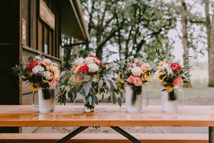 Four Bouquets in pitchers of water
