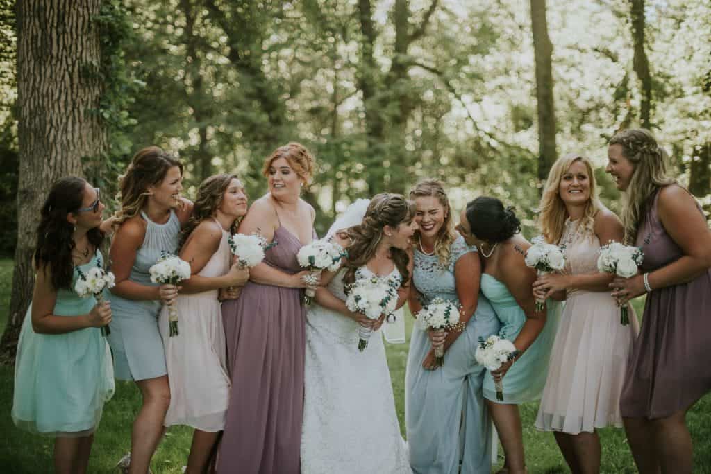 bridal party in mutli colored dresses