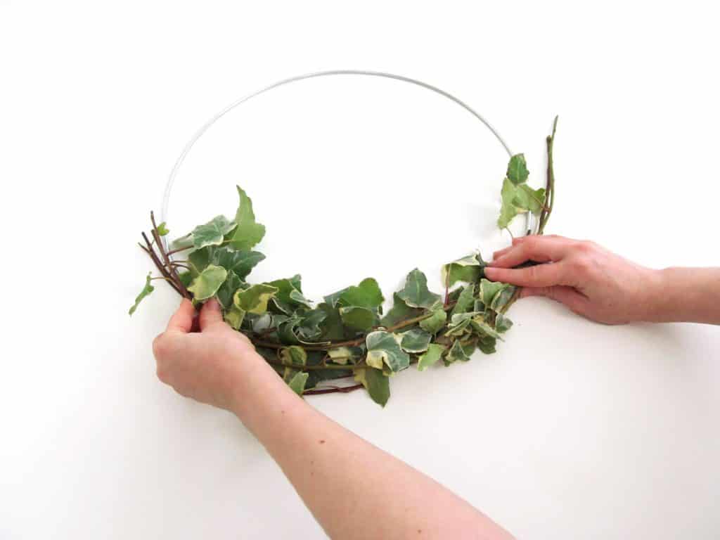 DIY floral hoop adding ivy