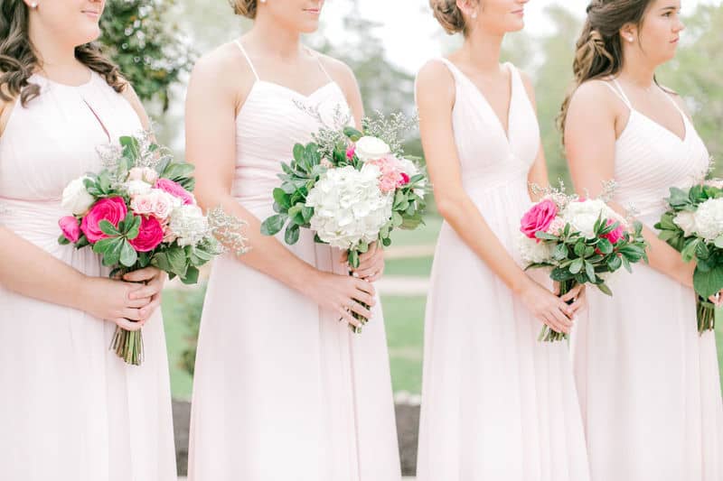 DIY Wedding Arrangement pink and white bouquets held by bridesmaids