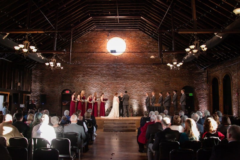indoor wedding venue with brick wall background