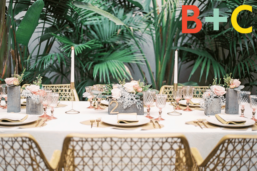 Table centerpieces with greenery background