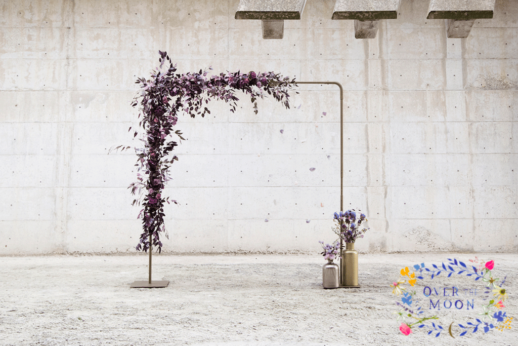 Metal frame with purple floral decorations
