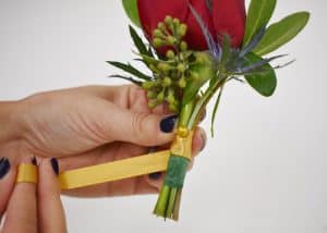 wrapping the stems with ribbon