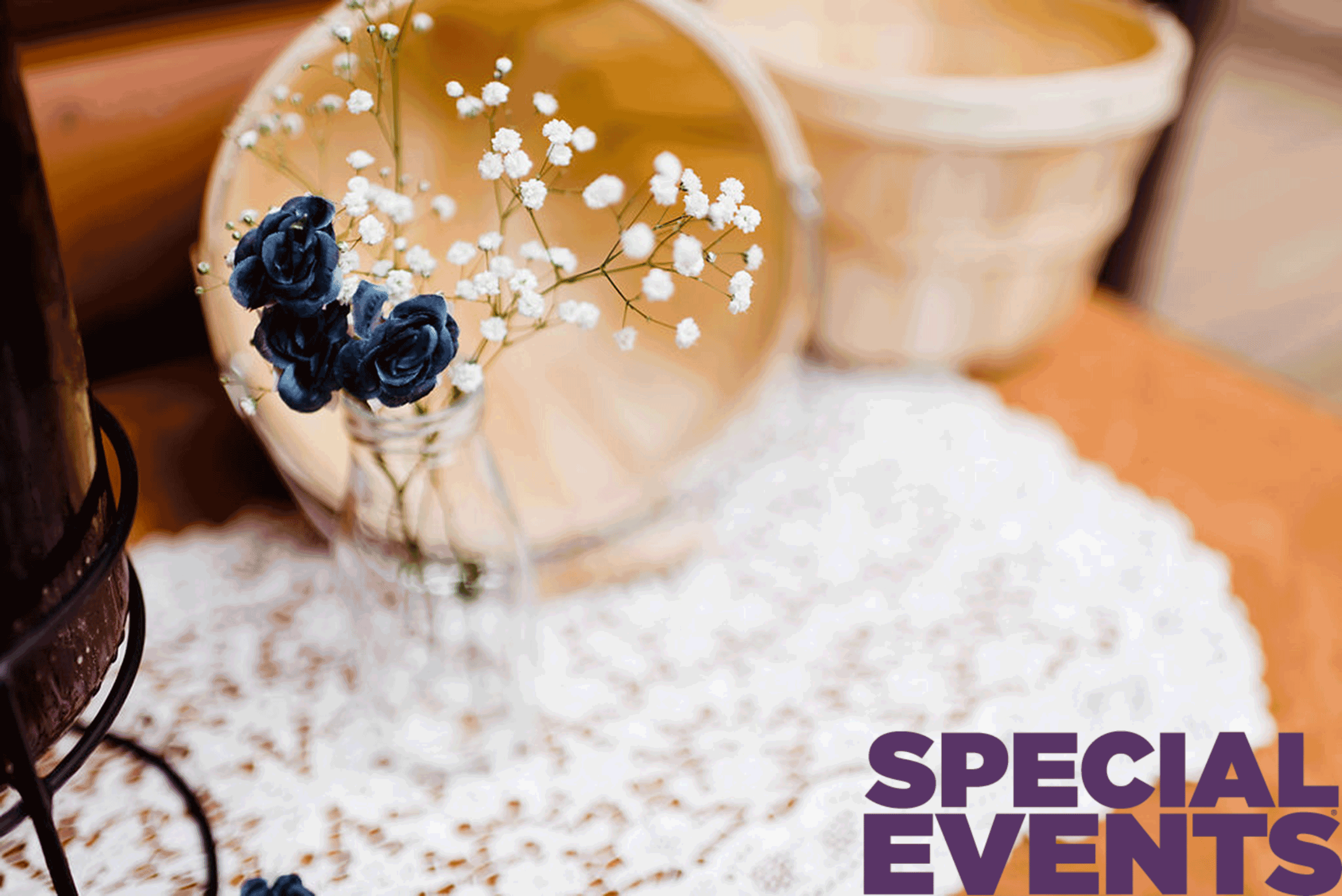 Blue and white flowers in a glass bottle