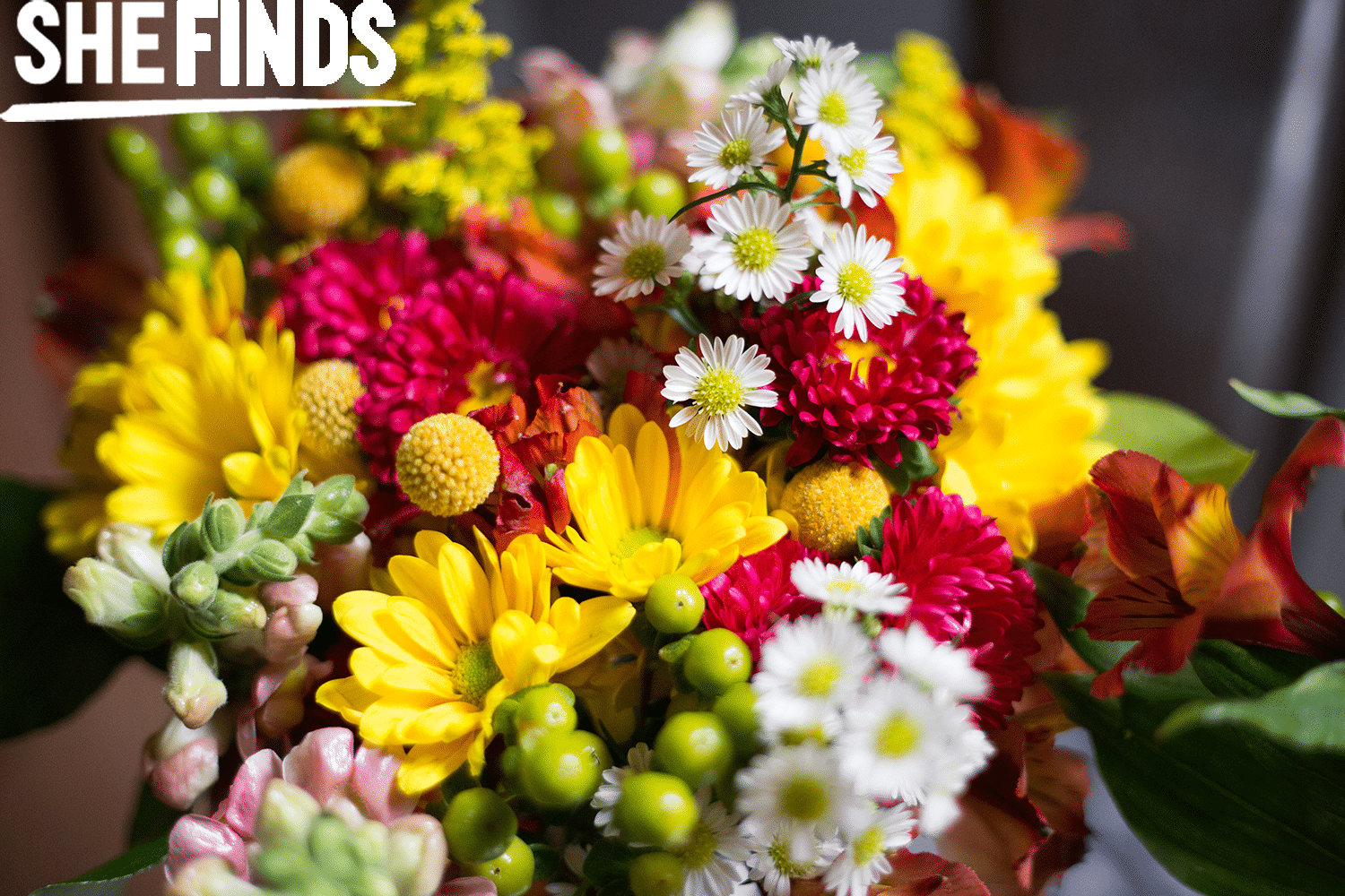 Red, yellow and white floral arrangement