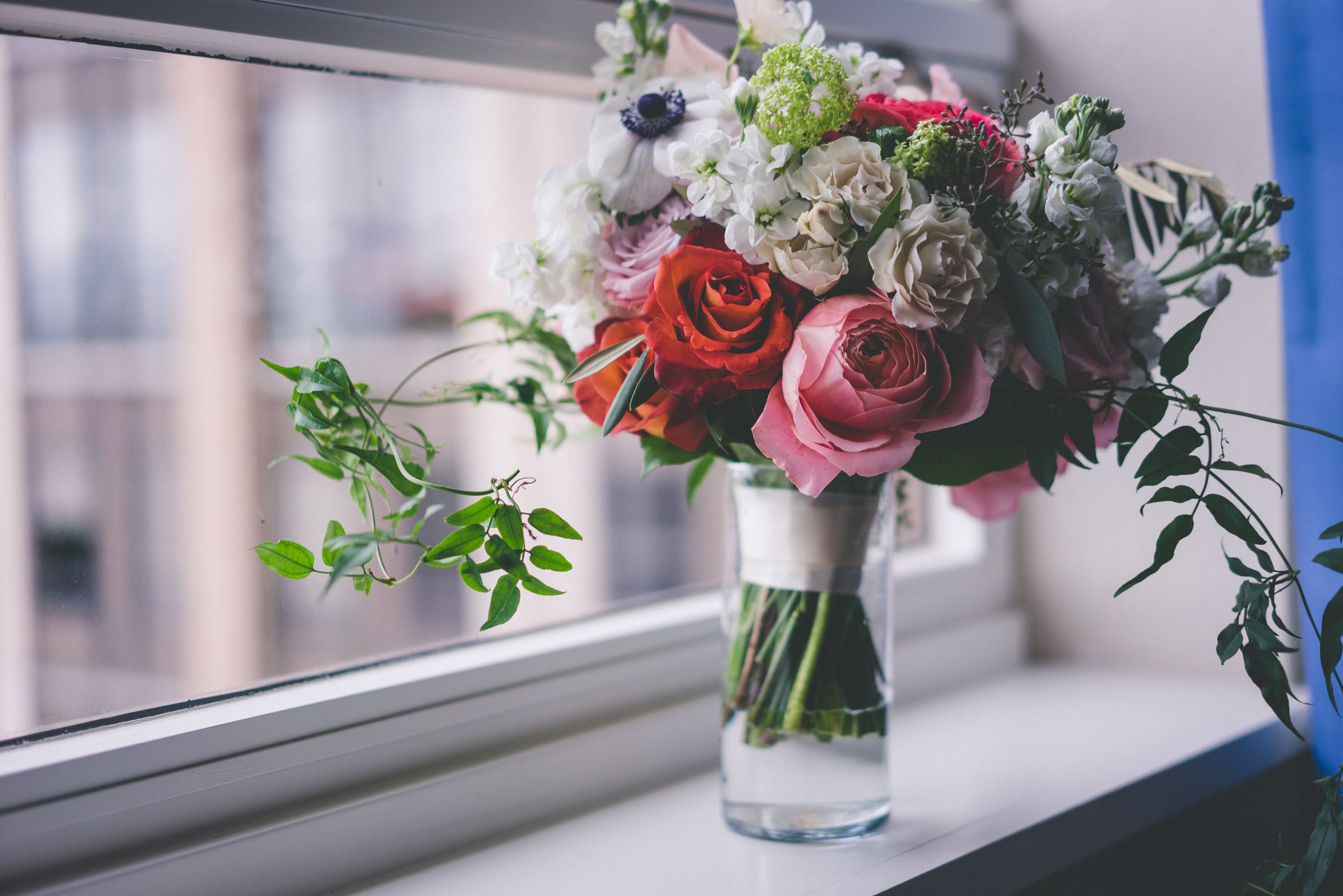 White, pink and red flower arrangements