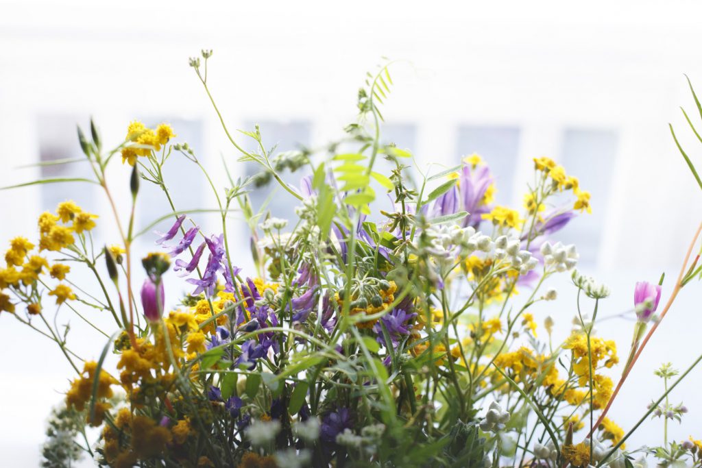 Purple and yellow June wedding flowers