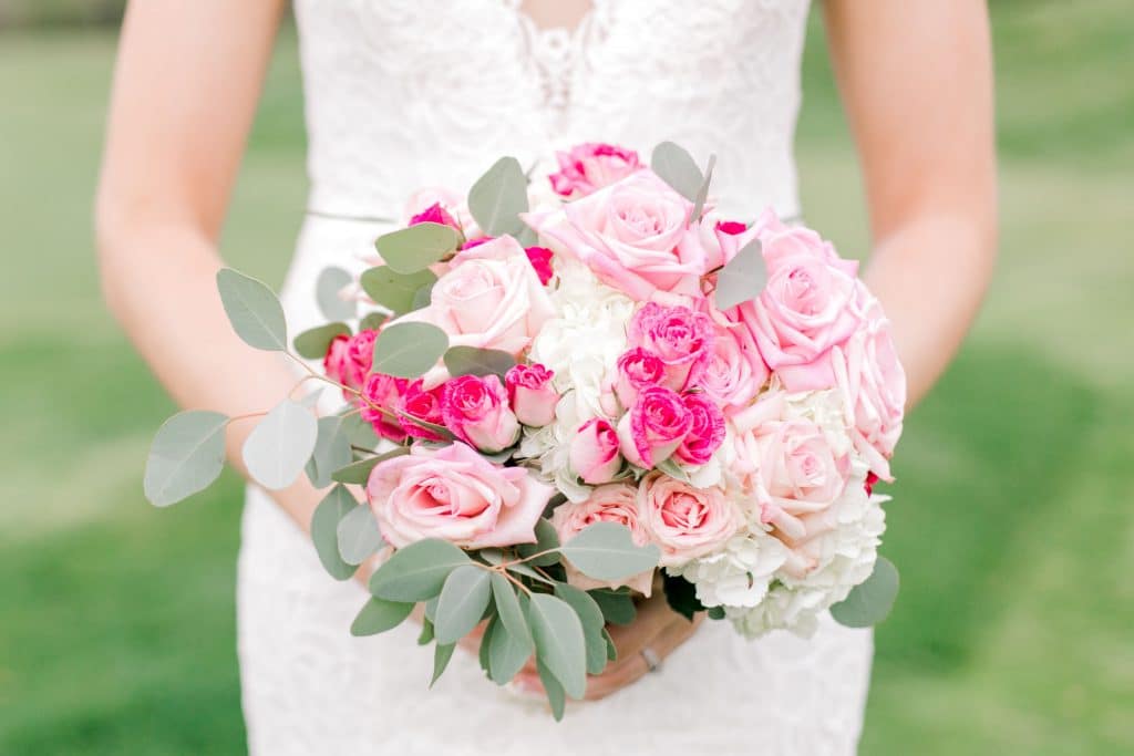 Hydrangeas, roses, spray roses, and silver dollar eucalyptus