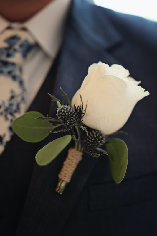 close up of a white flower boutonniere