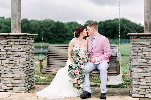 Couple sitting on a swing