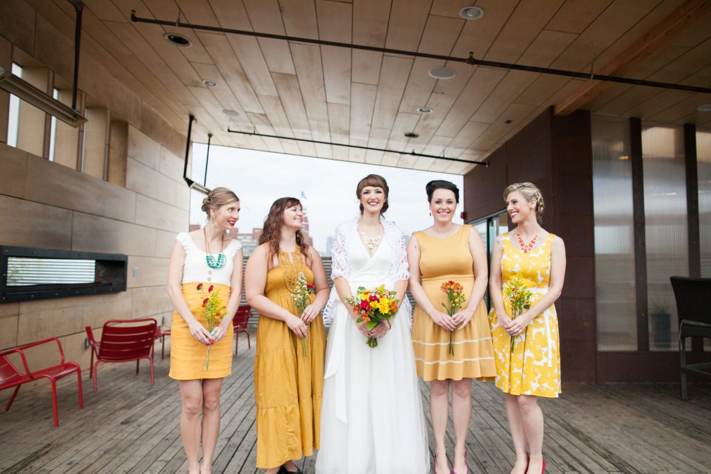 Bridge with bridesmaids in yellow dresses