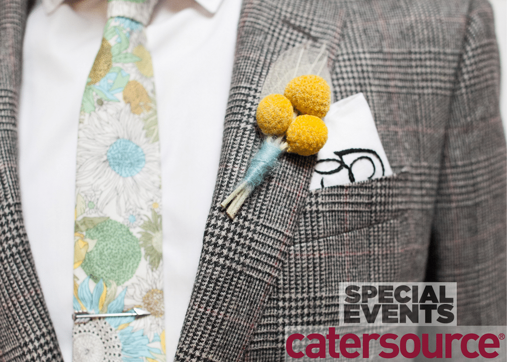 blazer with yellow flower boutonniere