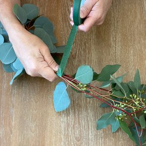 Eucalyptus Centerpiece Taping stems together