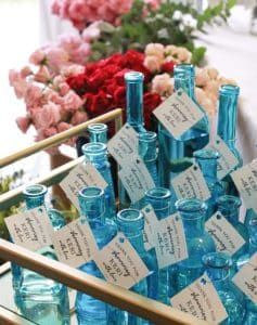 Light blue glass jars with thank you cards