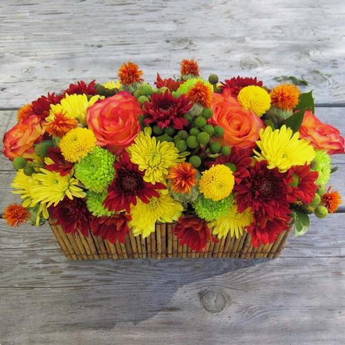 vibrant DIY Thanksgiving flowers bright orange and yellow