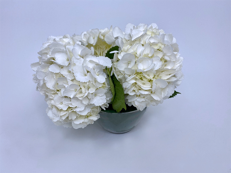 adding floral foam stacked above the glass