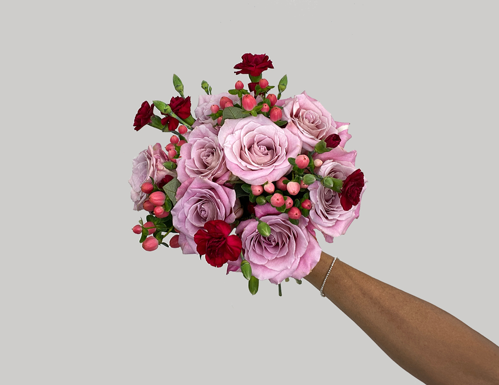 Adding White freesia to the DIY bouquet