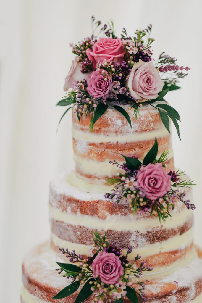 Naked tiered cake with flowers