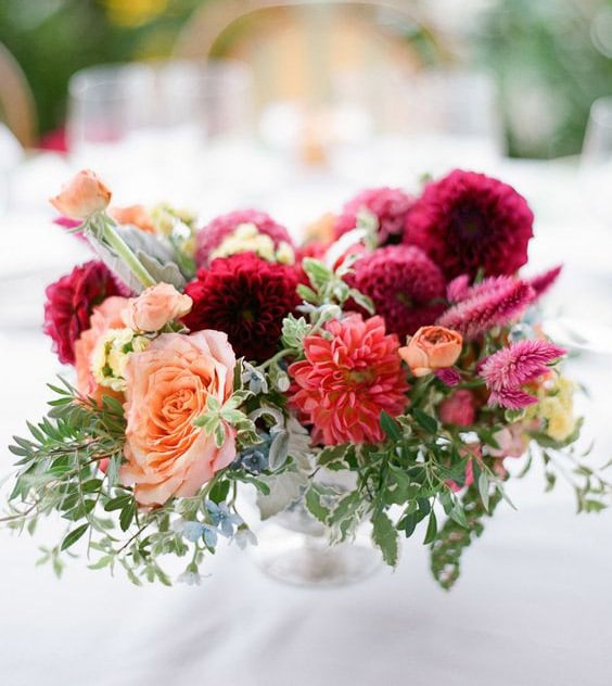 Table Centerpiece in Red, Orange and Hot Pink Dahlias