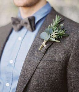 Mixture of Greenery Boutonniere