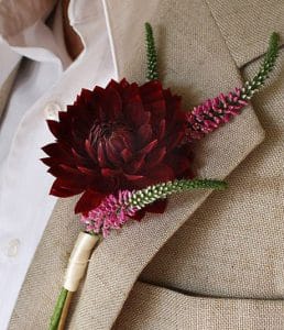 Purple dahlia boutonniere