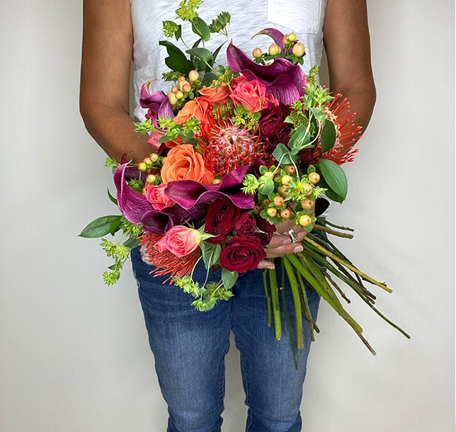 Holding Orange DIY Bouquet