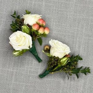 Corsage spray roses, hypericum berries and eucalyptus