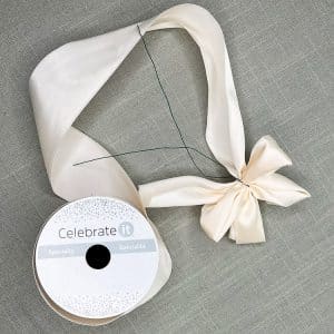 Corsage ribbon, flowers tape together with easy instructions.