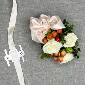 Attach flowers to wristlet to finish corsage