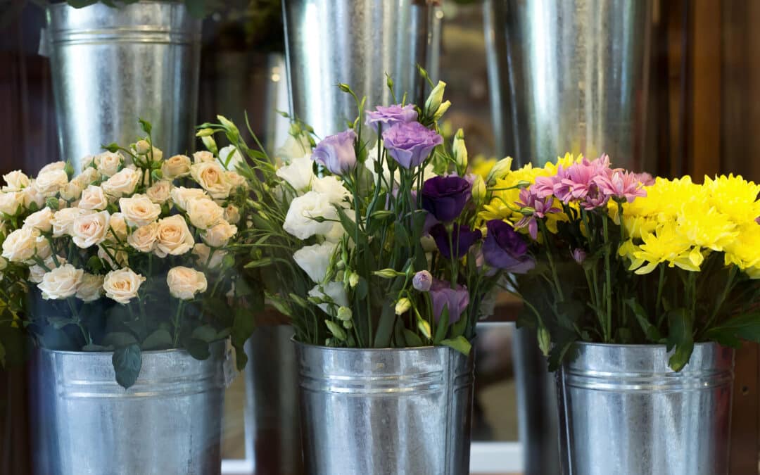 flowers in buckets