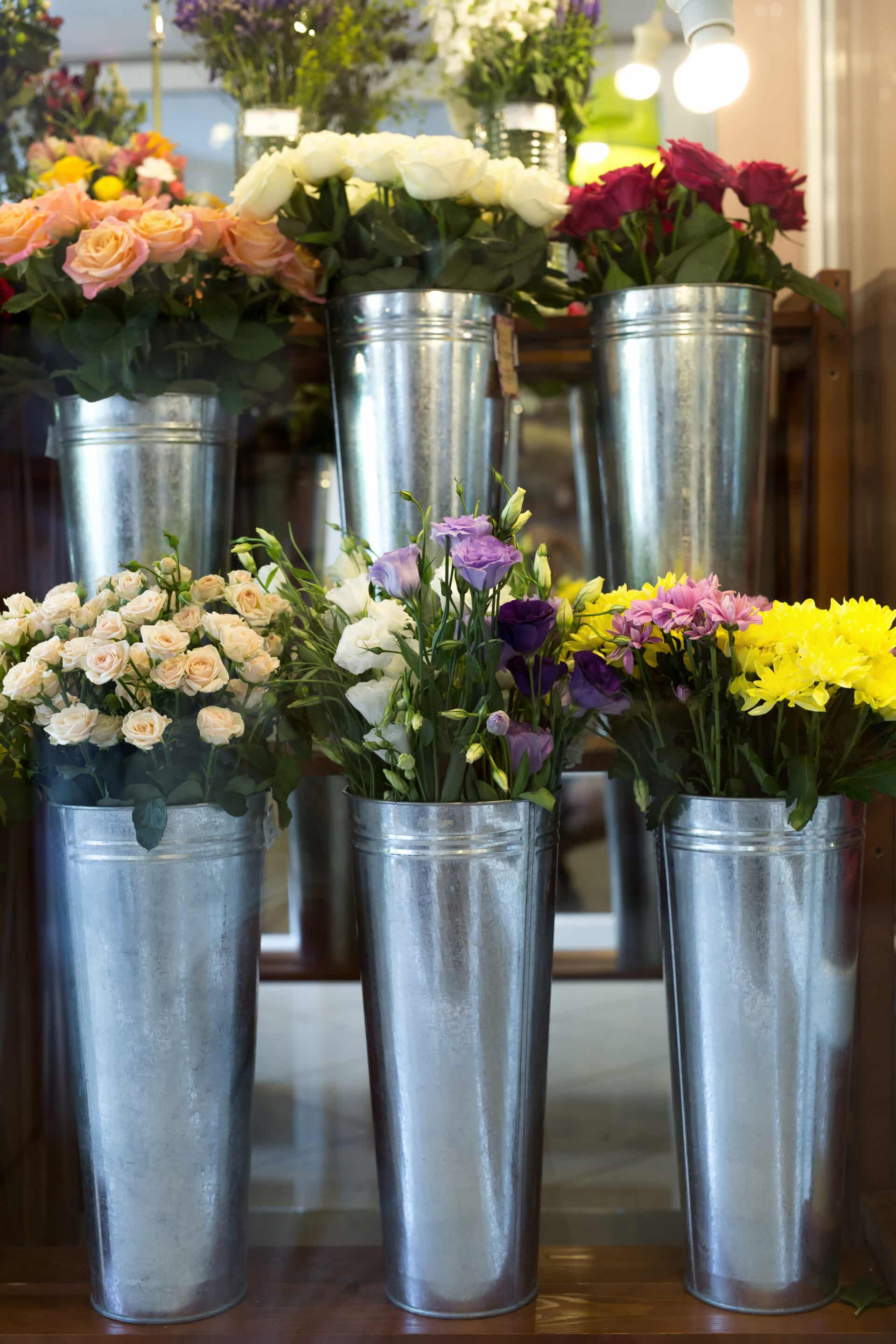 flowers in buckets